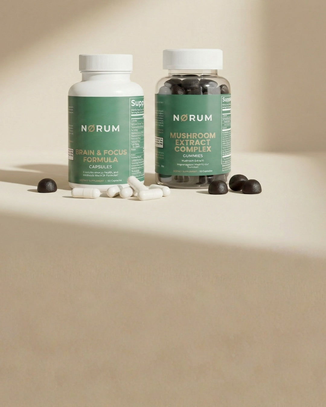 Two supplement bottles with capsules and gummies on a beige background in natural light.