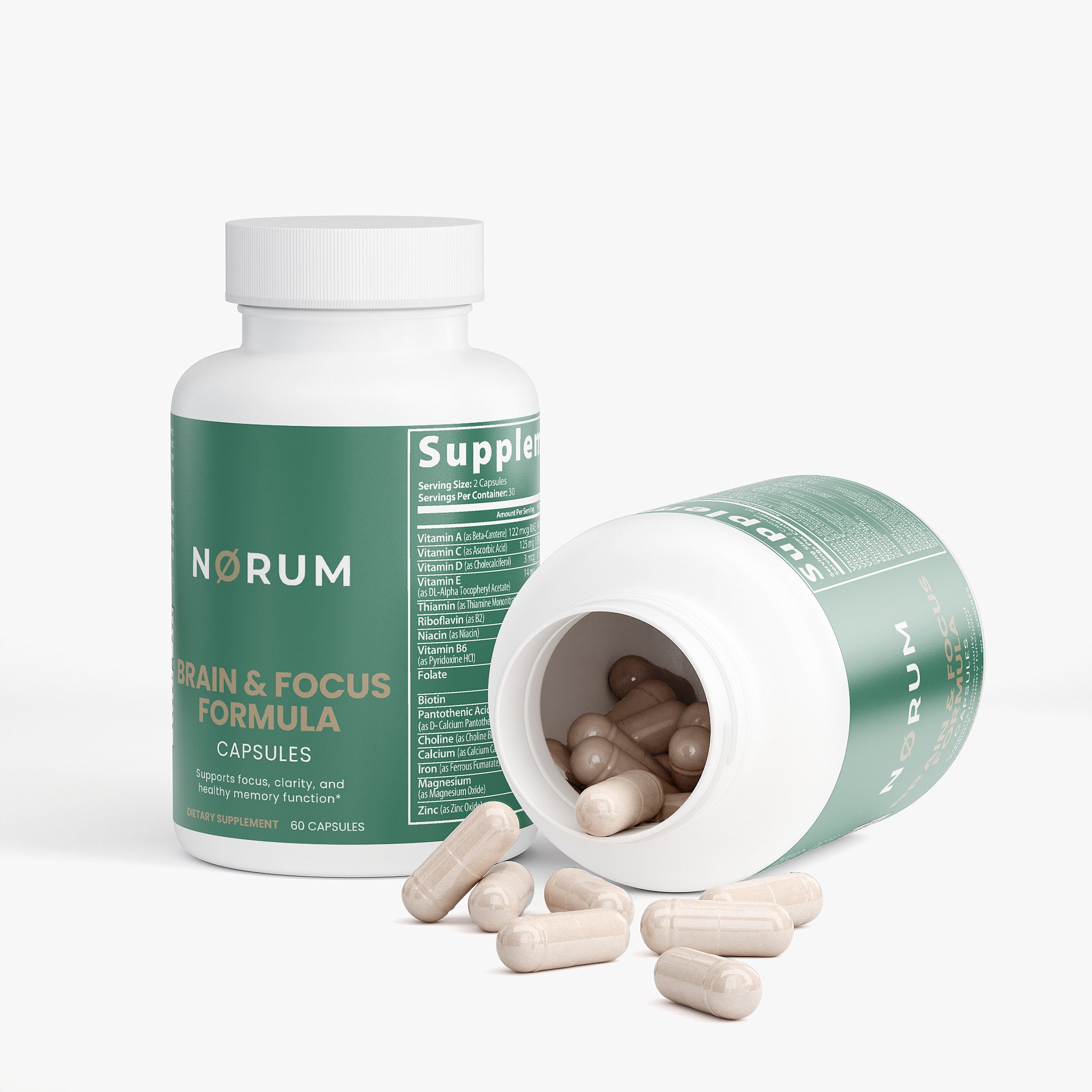 Brain and focus supplement capsules in white bottles with green labels, some capsules spilled out.